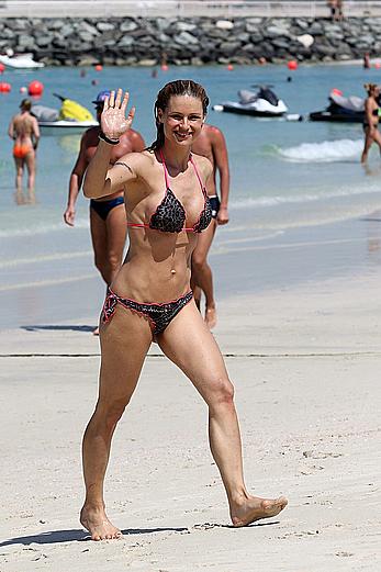 Michelle Hunziker in bikini at a beach