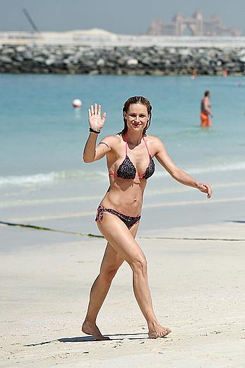 Michelle Hunziker in bikini at a beach