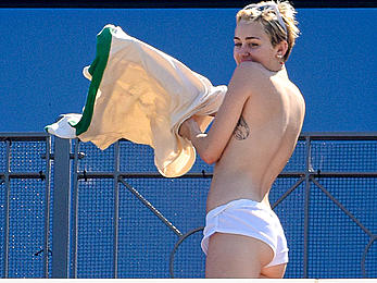 Miley Cyrus caught topless in Sydney