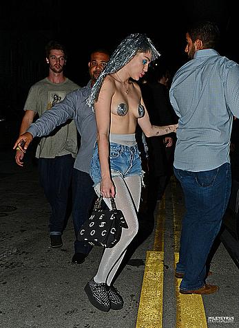 Miley Cyrus almost topless arriving and Performing at Art Basel in Miami