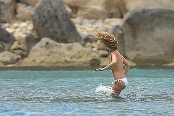 Millie Mackintosh topless on a yacht in Ibiza