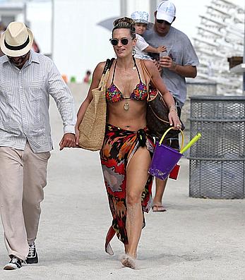 Molly Sims wearing a bikini in Miami