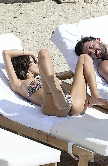 Nabilla Benattia topless on a beach in St. Barts