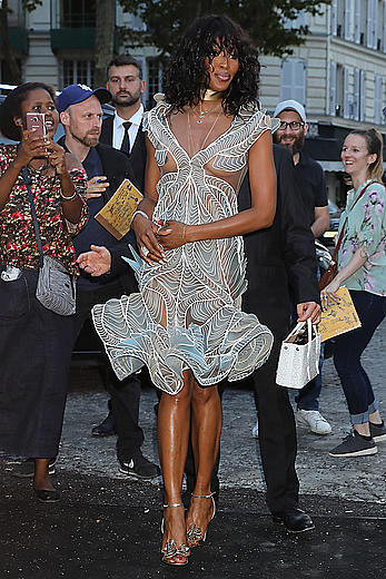 Black Naomi Campbell in see through dress