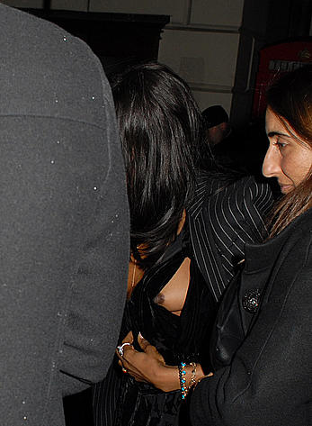 Naomi Campbell nipple slip leaving Madonnas party