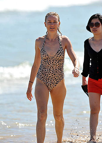 Naomi Watts wearing a swimsuit at a beach in Australia