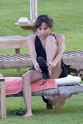 Natalie Imbruglia nipslip wearing a bikini in Sardinia