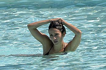 Natalie Imbruglia nipslip wearing a bikini in Sardinia