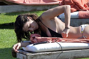 Natalie Imbruglia nipslip wearing a bikini in Sardinia