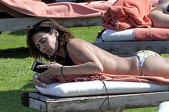 Natalie Imbruglia nipslip wearing a bikini in Sardinia