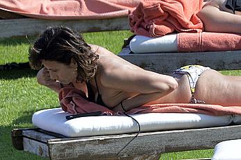 Natalie Imbruglia nipslip wearing a bikini in Sardinia