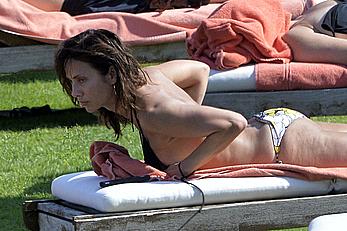 Natalie Imbruglia nipslip wearing a bikini in Sardinia