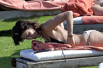 Natalie Imbruglia nipslip wearing a bikini in Sardinia