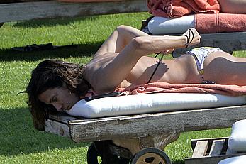 Natalie Imbruglia nipslip wearing a bikini in Sardinia