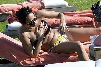 Natalie Imbruglia nipslip wearing a bikini in Sardinia