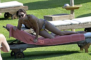 Natalie Imbruglia nipslip wearing a bikini in Sardinia