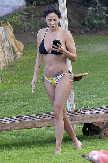 Natalie Imbruglia nipslip wearing a bikini in Sardinia