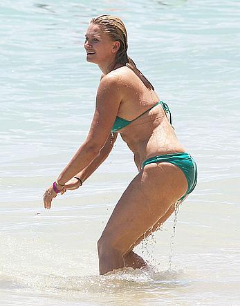 Natasha Henstridge in blue bikini at a beach in Hawaii