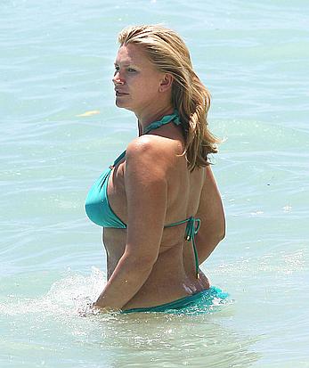 Natasha Henstridge in blue bikini at a beach in Hawaii