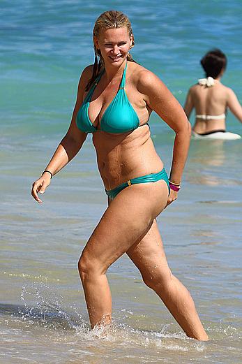 Natasha Henstridge in blue bikini at a beach in Hawaii