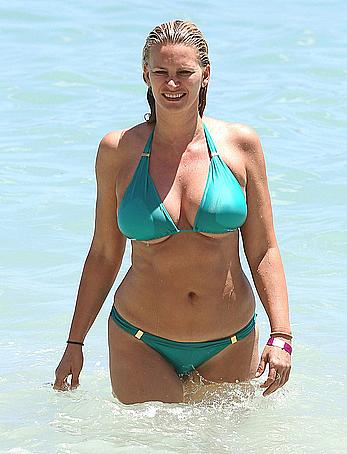 Natasha Henstridge in blue bikini at a beach in Hawaii