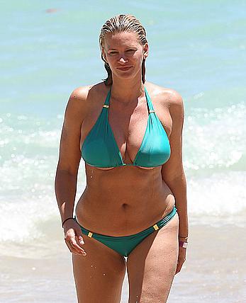 Natasha Henstridge in blue bikini at a beach in Hawaii