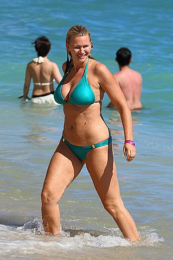 Natasha Henstridge in blue bikini at a beach in Hawaii