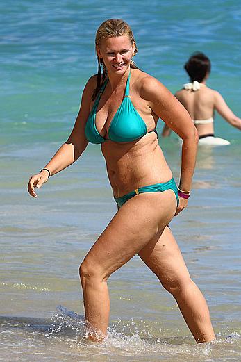 Natasha Henstridge in blue bikini at a beach in Hawaii