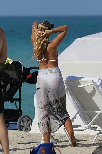 Natasha Oakley in white bikini at a beach in Miami