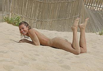 Nell McAndrew fully nude on a beach in Barbados