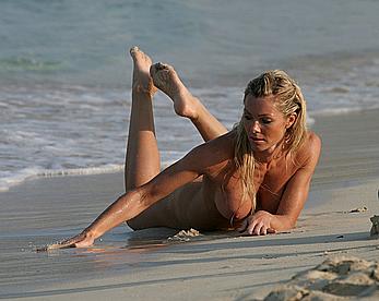 Nell McAndrew fully nude on a beach in Barbados