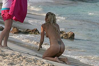 Nell McAndrew fully nude on a beach in Barbados