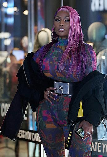 Nicki Minaj braless see through to tits In Milan