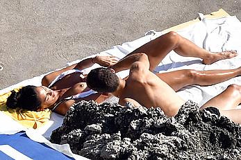 Nicole Scherzinger boobs out while sunbathing with boyfriend in Capri