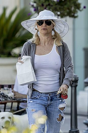 Nicollette Sheridan in see through shirt