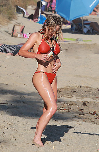 Nikki Lund in red bikini candids in Malibu