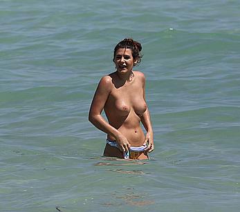 Nima Benati topless in a water in Miami