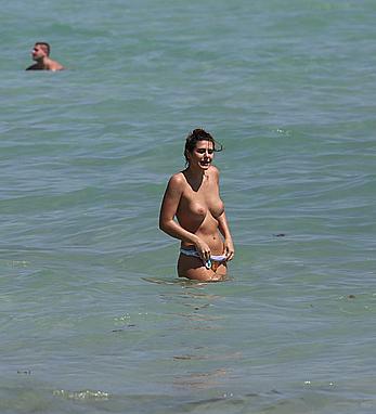 Nima Benati topless in a water in Miami