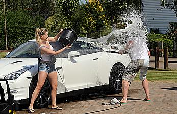 Ola Jordan washing car in Kent in see through wet top