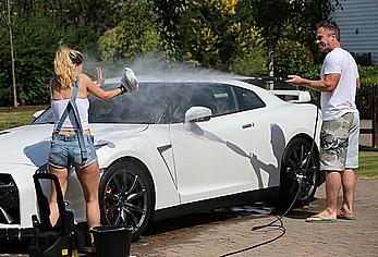 Ola Jordan washing car in Kent in see through wet top