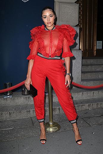 livia Culpo in red see through suit at Tag Heuer Event in NYC