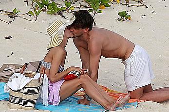 Olivia Palermo sunbathing without bra on the beach in St. Barths