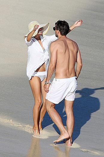 Olivia Palermo sunbathing without bra on the beach in St. Barths