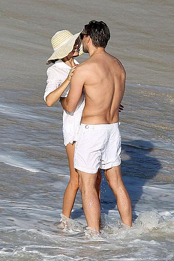 Olivia Palermo sunbathing without bra on the beach in St. Barths