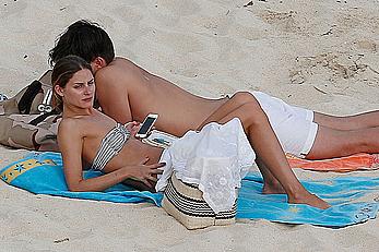 Olivia Palermo sunbathing without bra on the beach in St. Barths