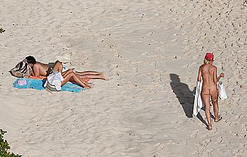 Olivia Palermo sunbathing without bra on the beach in St. Barths