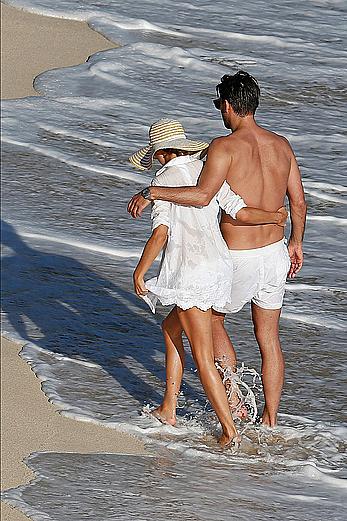 Olivia Palermo sunbathing without bra on the beach in St. Barths