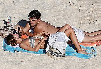 Olivia Palermo sunbathing without bra on the beach in St. Barths