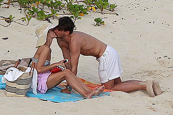 Olivia Palermo sunbathing without bra on the beach in St. Barths