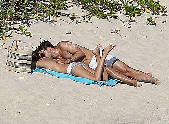 Olivia Palermo sunbathing without bra on the beach in St. Barths